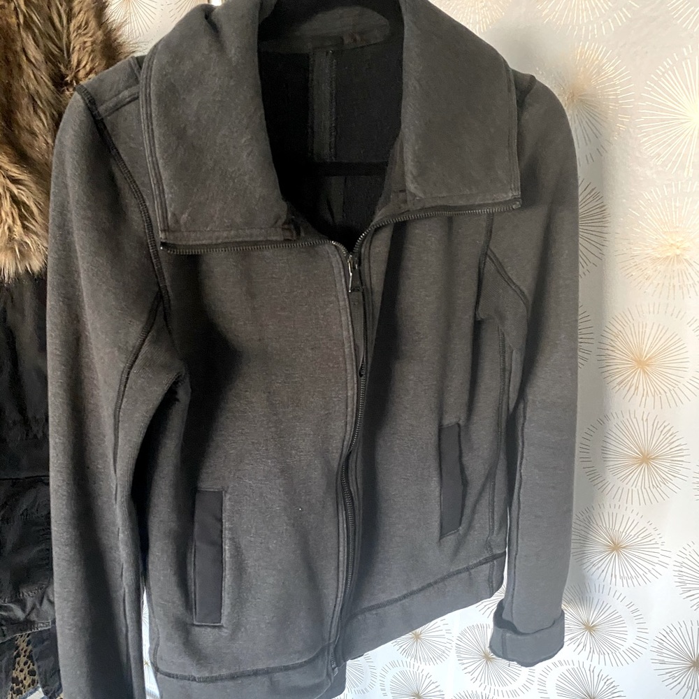 Lululemon jacket size 8. Zip up back.